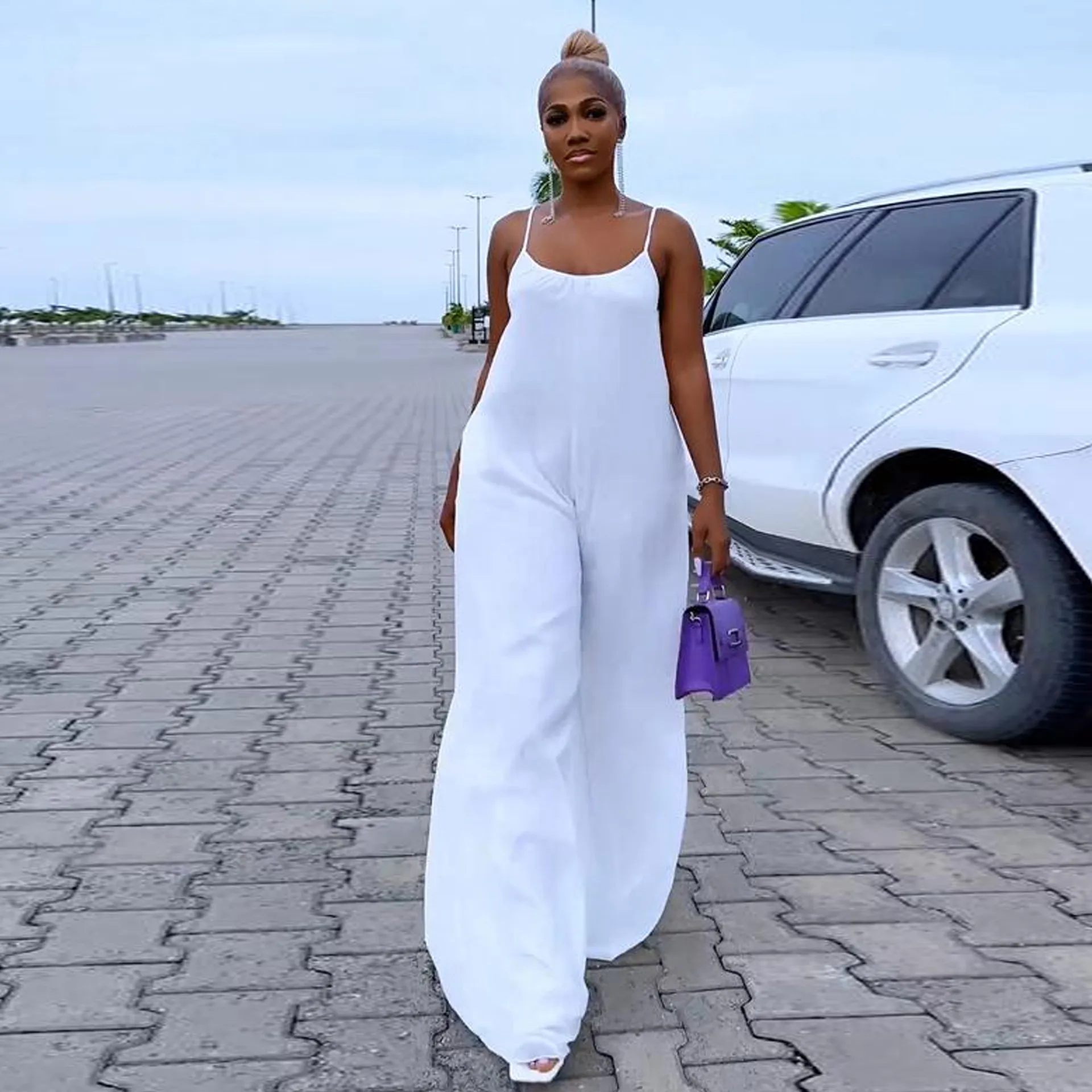 Stylish White Spaghetti Strap Jumpsuit With Pockets Wide Leg Romper For  Women, Plus Size Perfect For Summer 2023 From Hengytrade, $12.99