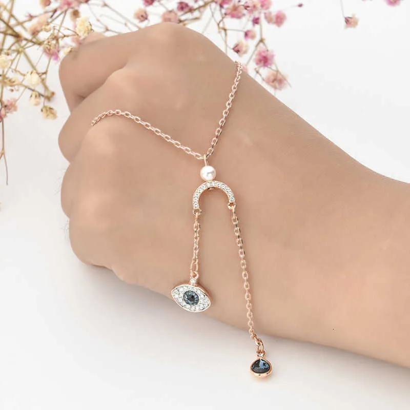 Shi Family Devil's Eye Collier Tassel Pearl Blue Eye Long Pendant Personnalité Clicule Chaîne Femelle Bijoux Femme