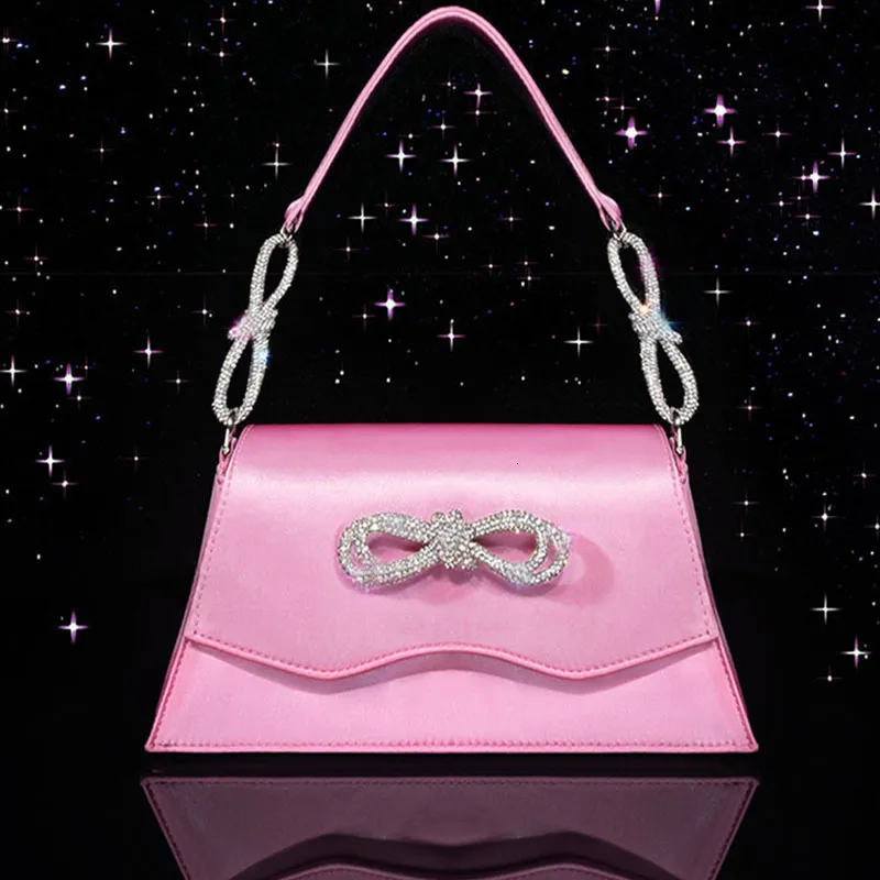 Avondtassen kristallen diamanten bowknot ontwerper zijden satijnen tas dames luxe roze tas voor feest boog glanzende handgreep prom handtas 230811