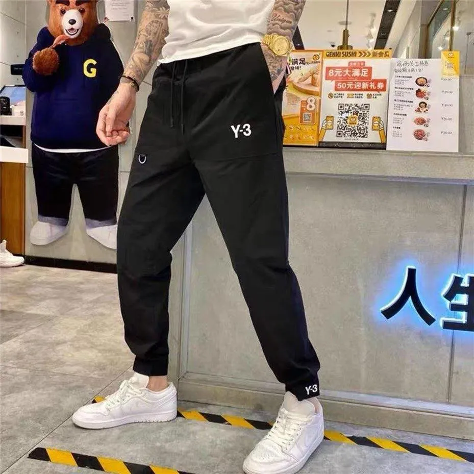 Fashion-20ss pants men running sweatpants loose Imported woven waterproof fabric Feel smooth soft and delicate Ribbed cuffsblack p212J