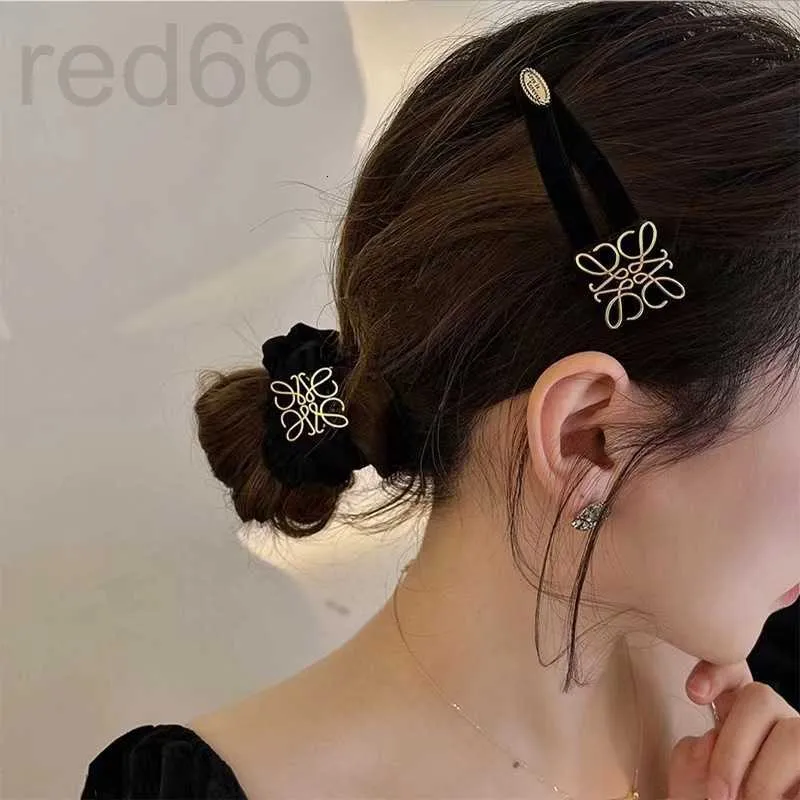 Headbands designer French gold patterned hair band niche simple clip high elasticity large intestine loop accessory for women KF4B