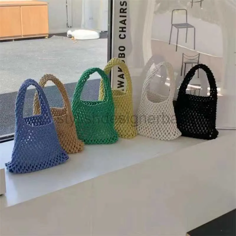 Beach Bags Spring and Summer New Pure Hand Knitted Cotton Rope Hollow Out Bag ins Style Fresh Photography Handbag Colorful Handwoven Bagstylishdesignerbags