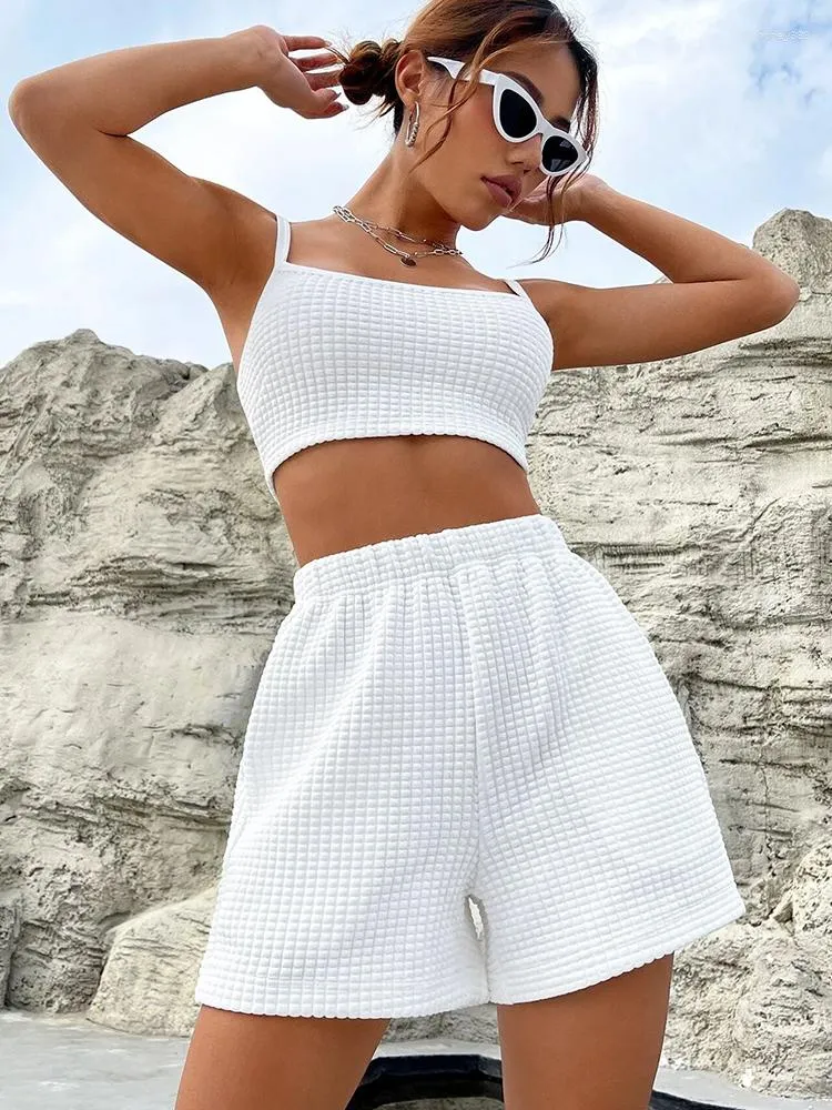 Suisses de survêtement pour femmes Summer White White Two Piece Sets Spagetti Spaget Top court et shorts de jambe large set 2023 Casual Sousplit Suit