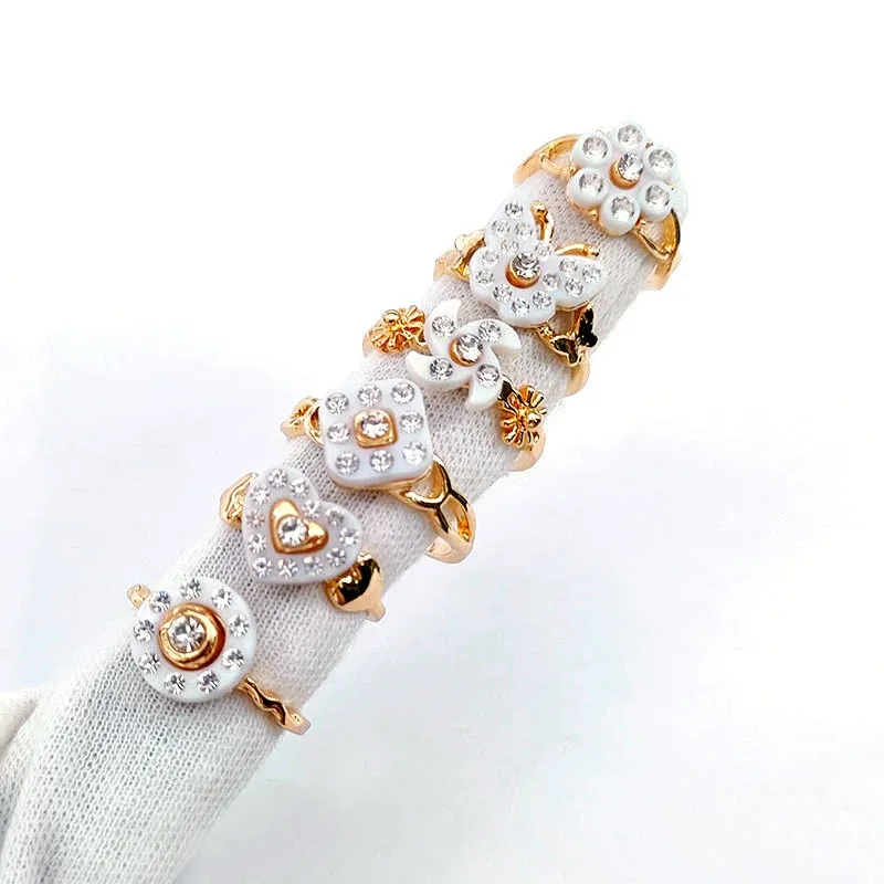 36 / PCS NOUVEAU GOLD DIAMOND BANG RING CHAMPEMENT Tempérament Love Flower Flowerfly Girls 'Index Anneau Gift Jewelry Bijoux en gros