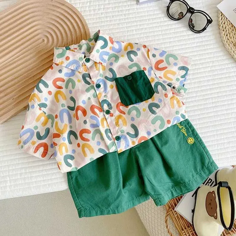 Set di abbigliamento Set di abbigliamento estivo per ragazzi Edizione Polo per bambini per bambini Pantaloncini Camicie floreali in due pezzi