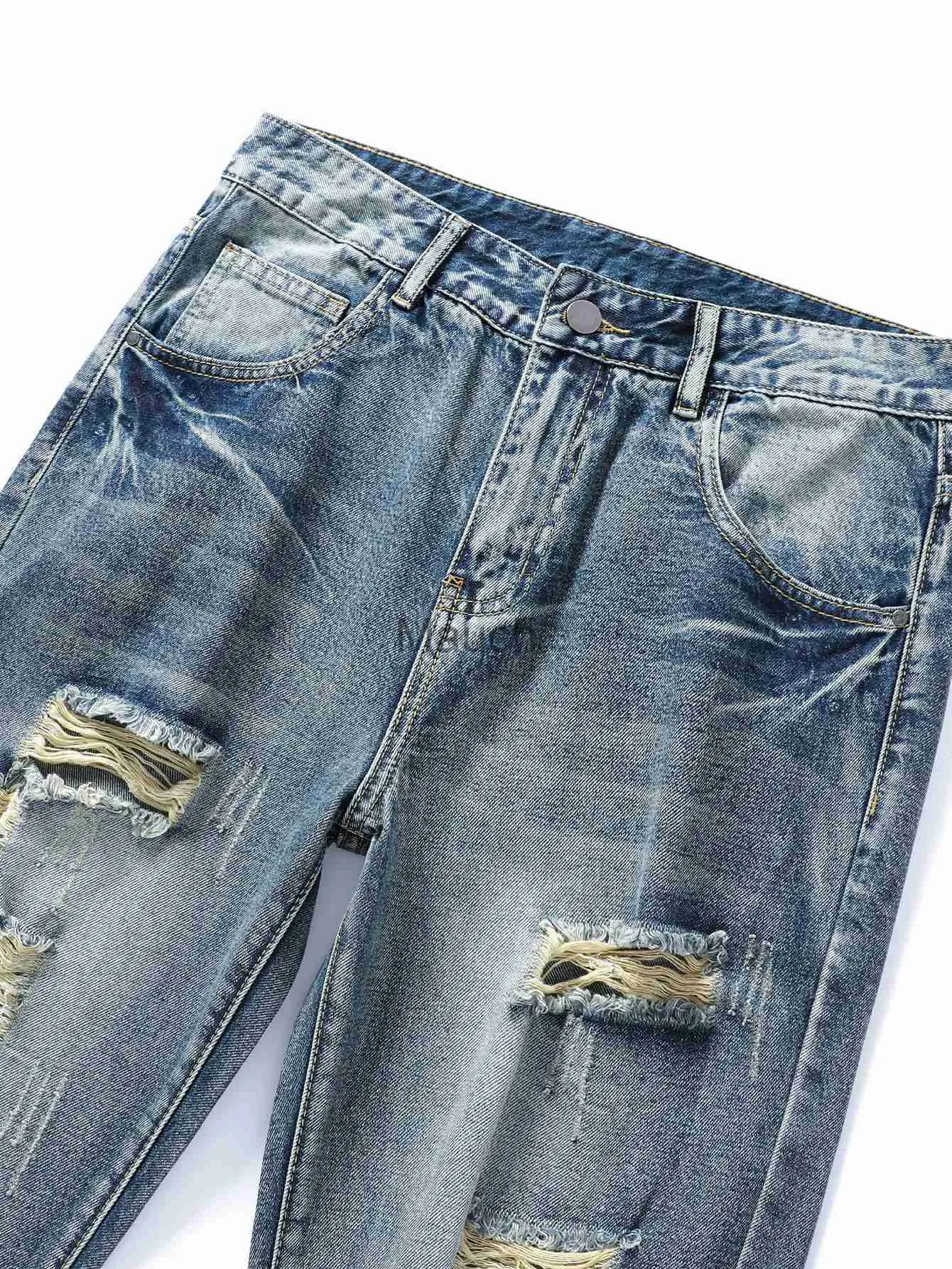 Gli Uomini Dei Jeans Maschili Hanno Strappato La Candeggina