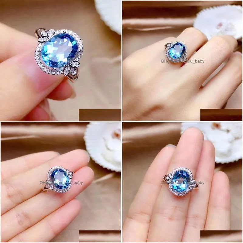 С боковыми камнями роскошные дизайнер 925 Sier Sparking Topaz Обручальное кольцо элегантное овальное большое камень для женщин для женщин. Размер 6 7 8 DHVPG