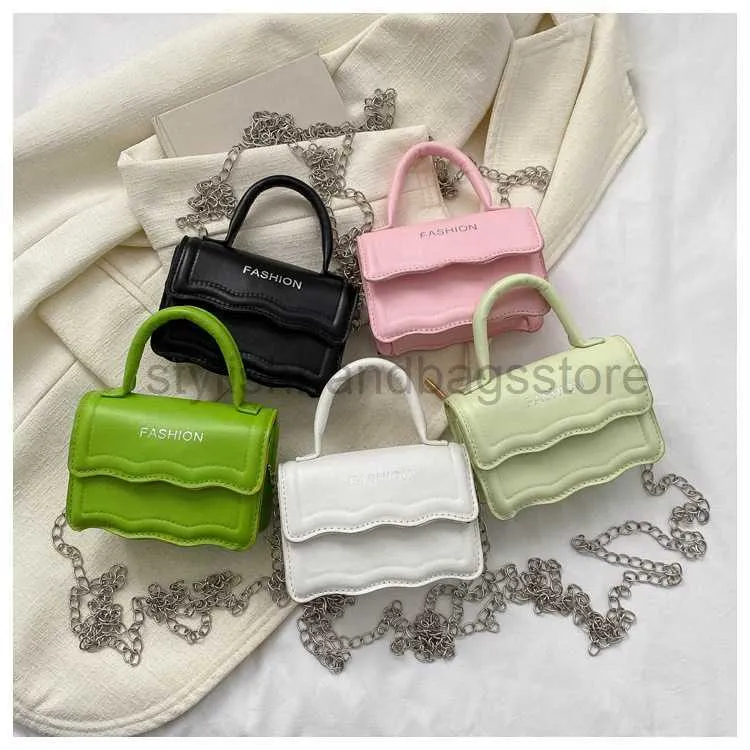 Cross Body Candy Color Liten Fresh Spring 2023 Ny liten lätt och fashionabla Crossbody Wave One Shoulder Handheld Bagstylishhandbagsstore