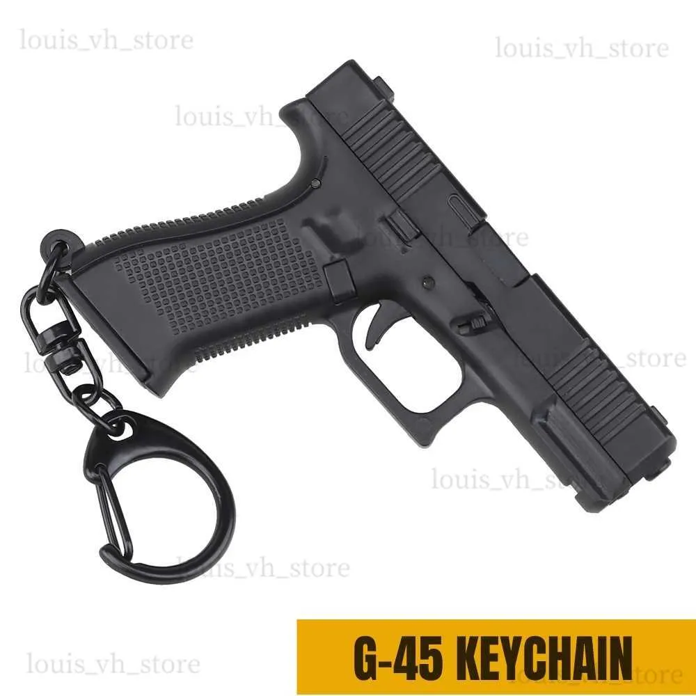G45 블랙 미니 총 키 체인 1 4 미니어처 총 모양 권총 키 링 펜던트 장식품 군대 팬 모델 컬렉션을위한 선물 T230816