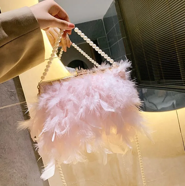 Factory wholesale ladies shoulder bags 3 colors sweet and elegant fire chicken feather chain bag metal pinch women handbag small fresh beaded pearl handbags 10787#