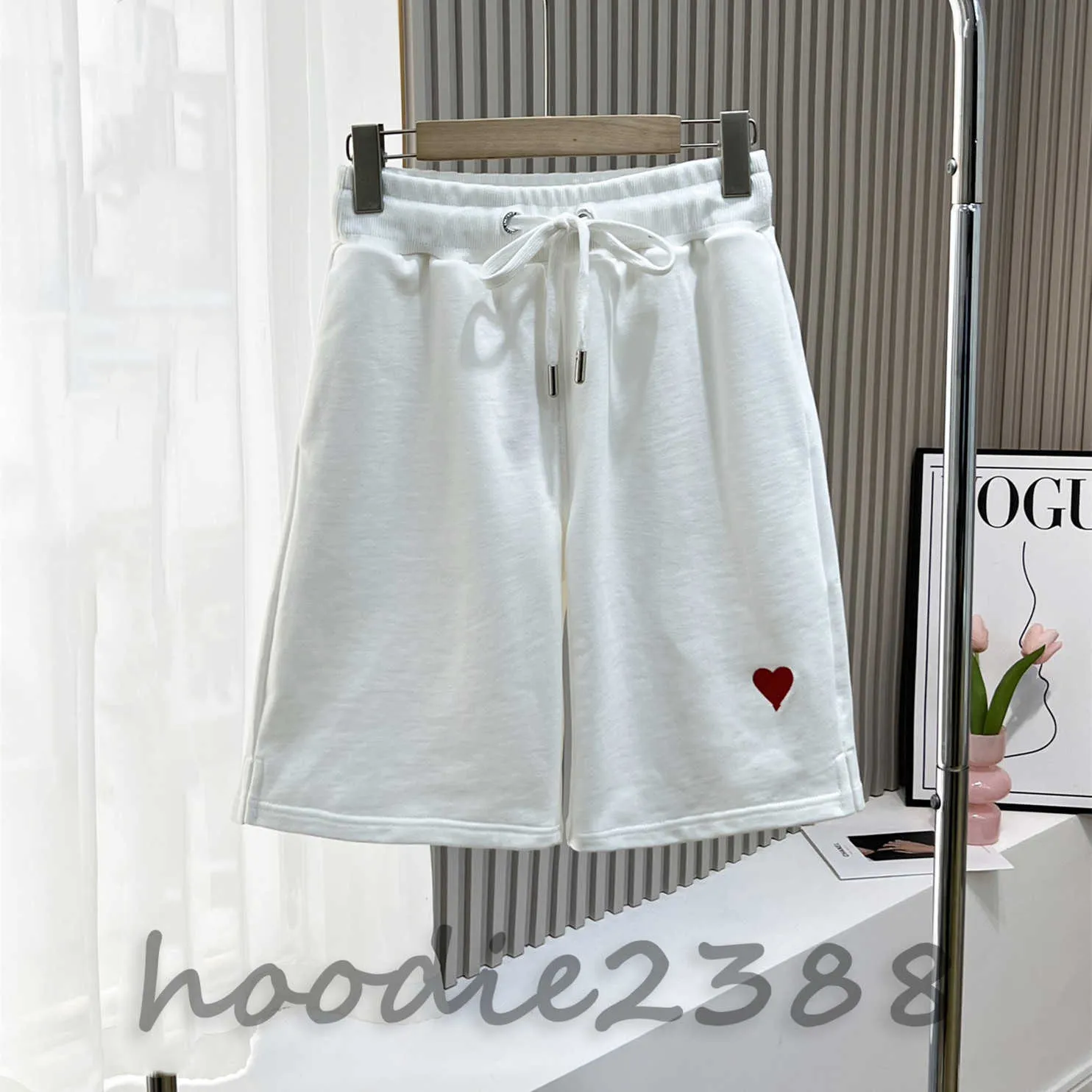 Witte unisex hoge versie van het modemerk Love Borduurwerk een heren en dames losse vijf punten casual losse shorts medium shorts strandbroek