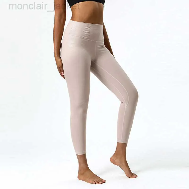 Desginer Al Yoga Legging Yoga's New ArtificiLeather Pantalon à haute élasticité pour femme Pantalon court de sport en nylon texturé en cuir texturé