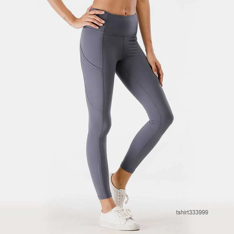 Les femmes alignent le yoga legging nues pantalons de sport de taille haute