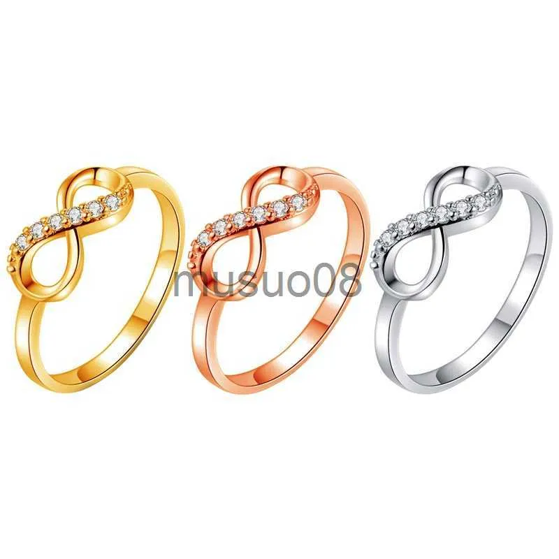 Anelli a fascia Nuovo design Lega di cristallo Twist Infinity Anelli di nozze per donna Oro Argento Colore Anello Dichiarazione Gioielli Regalo del partito All'ingrosso J230817