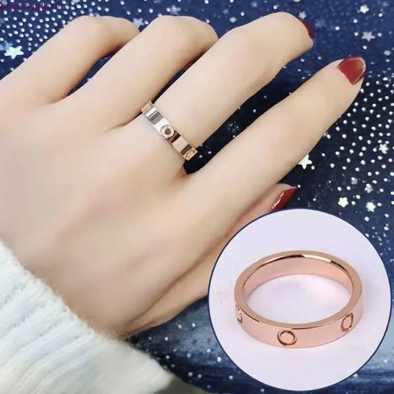 94EH RING Zircon couple Femmes 5 mm en acier inoxydable en acier rose polie Rose Bijoux de la Saint-Valentin Cadeau pour copine Accessoires en gros