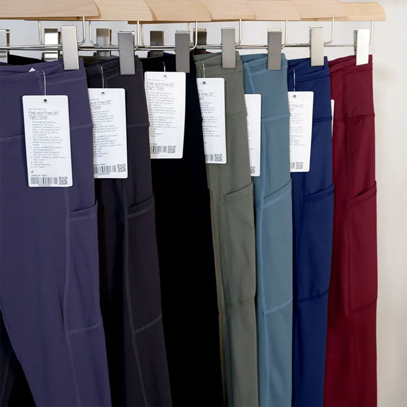 Les pantalons de yoga LU-77 alignent les collants multi-poche à taille haute brossée à double face coulant avec des cultures de points réfléchissantes 2023top