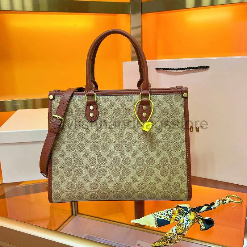 Axelväskor Hong Kong Koujia 2023 Ny väska Fashion äkta läder handhållen en axel crossbody väska hög kapacitet på väska väska