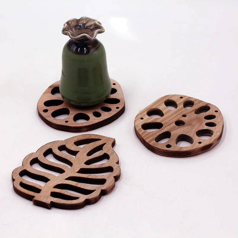 100 pezzi/lotto di sandalo ebano placemate creativo a fessura a radice di loto cuscinetto bocchetta per tè da tè da cucina da cucina