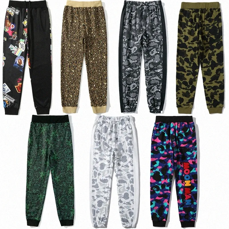 Designer byxor hajbyxor camo mens grafiska byxor kamouflage lysande svettbyxor färg graffiti jogging sömmar balk fötter manliga kvinnliga par c9uv#