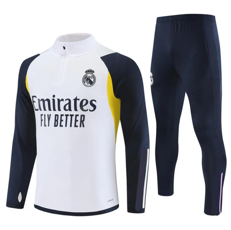 Real madrid childrens tracksuit hotsell