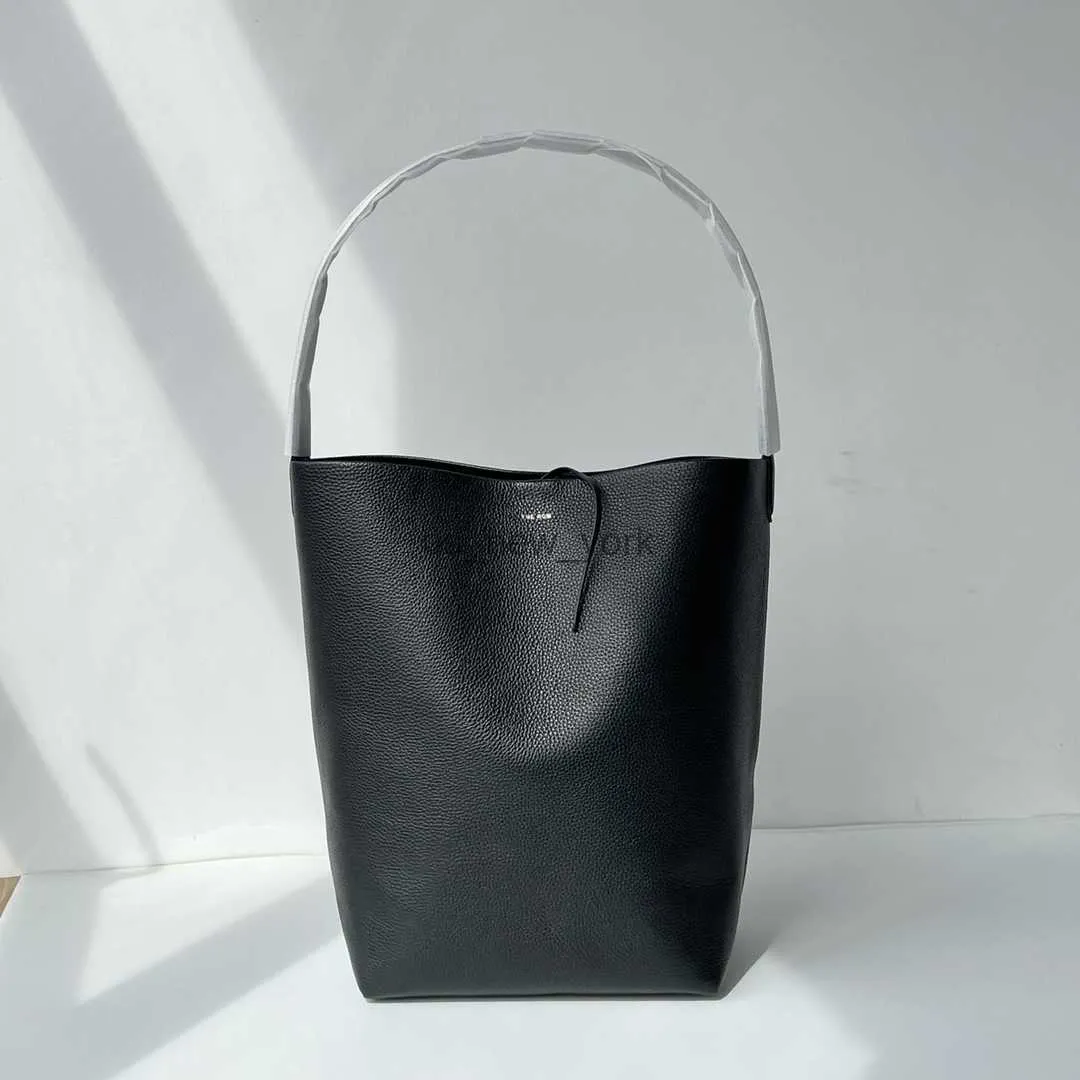 Totes The Row Ladies Lychee Grain Cowhide Gran capacidad Commuter Versátil Un hombro Underarm Bag Bucket Bag Tote Bag HKD230818