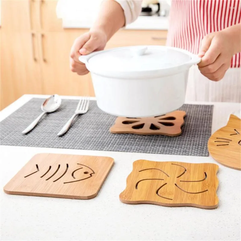 Tapetes de mesa Cartoon criativos de madeira Placemats Isolle Pad Hollow Out On Longe Cheve Tope Cork Cork Cork Cork