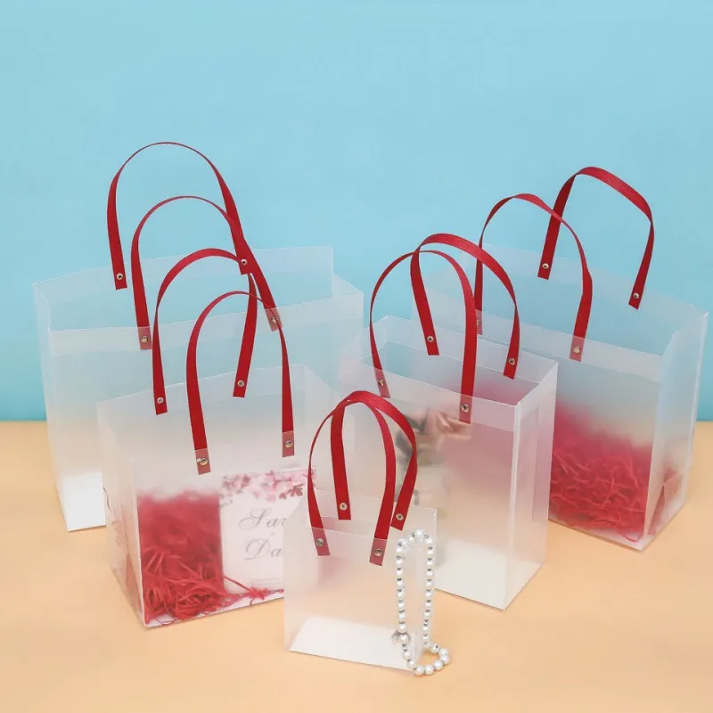 PP Plastikowa torba z czerwonym uchwytem PVC Transparent Frosted Gift Bag na imprezę ślubną świąteczną hurtową LX6039