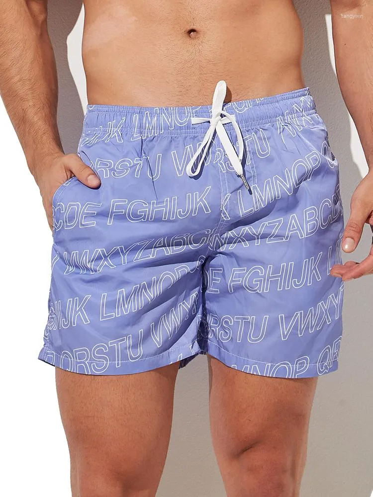 Shorts pour hommes Athleisure Cordes Poches Courir Bain de soleil Respirant Plage Gym Lettre Imprimé Boxer Mi Pantalon