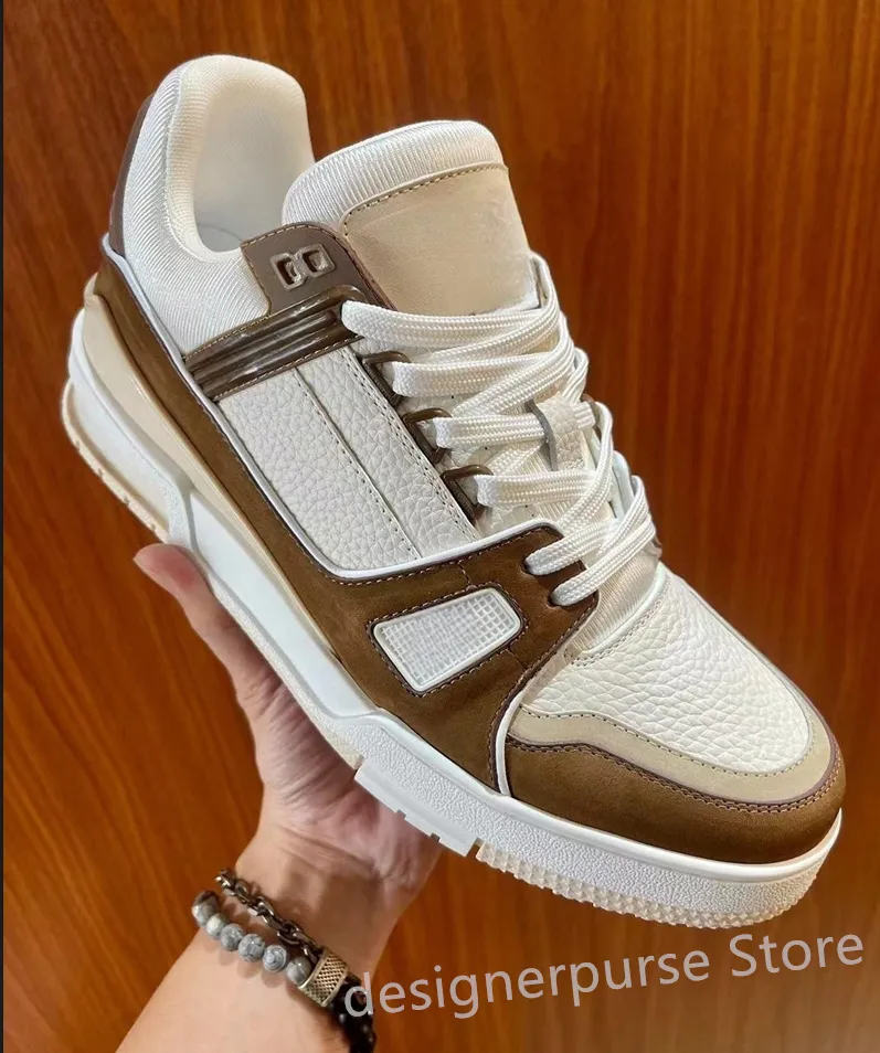 2023 NY DESIGNER TRAKER SNEAKERS KRAMNA CALFSKIN GENUINE LÄDER MENS SNEAKERS LÅG TOP BEANDA Skate Shoes For Women New Color Brand Mens Casual Shoes