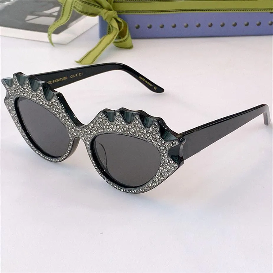 Gafas de sol de diseñador G 0781S moda de lujo para mujer personalidad clásica marco de ojo de gato con diamantes plateados mujer fiesta viaje outdoo254M