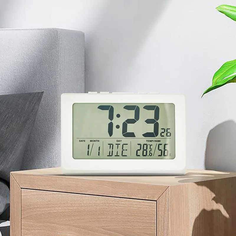 Väggklockor LCD -elektriska skrivbordsvattenklocka Vit med kalender och digital temperaturfuktighet Modern hemmakontorsklocka Sovrum