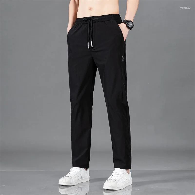 Pantaloni da uomo estate casual sottile elasticità morbida elasticità in giratta tasca a colori solido Corea grigio grigio lavoro lavoro maschio 5xl