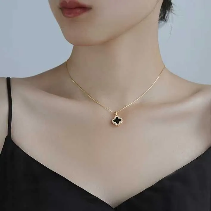 Collier double face trèfle à quatre feuilles pour femmes couleur haut de gamme acier titane rapide filet rouge même pendentif Qixi Festival cadeau