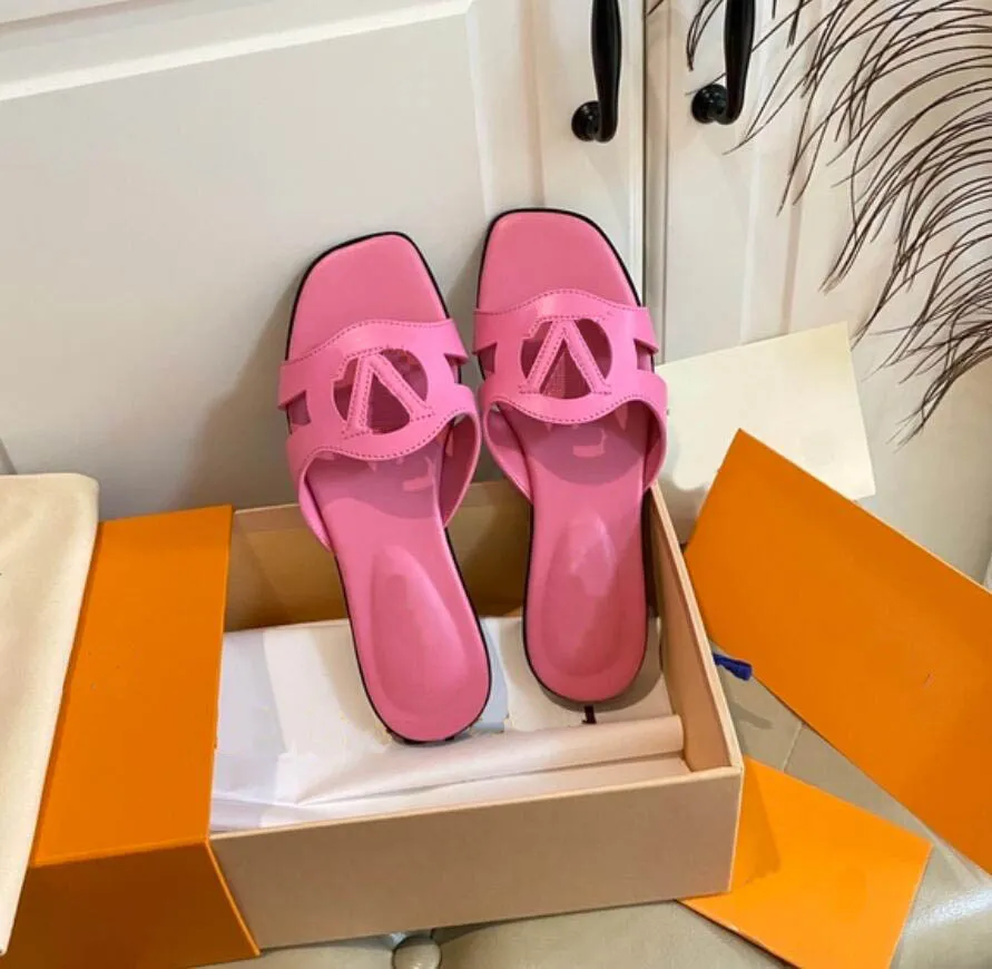 Isola Diseñador Mujer zapatillas de color rosa planas Isola Flat Mule flip flop al aire libre moda de verano Sandalias de cuero genuino metálico diapositivas recortadas 35-43Box