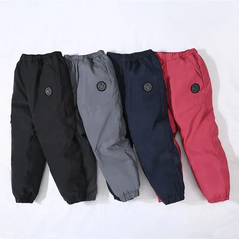 Byxor Casual Girl Boy Solid Winter Pants 90% DOWM Tjocka varma byxor Vattentäta skidbyxor 2-14 år Elastic Sports Baby Kid Pant 230821