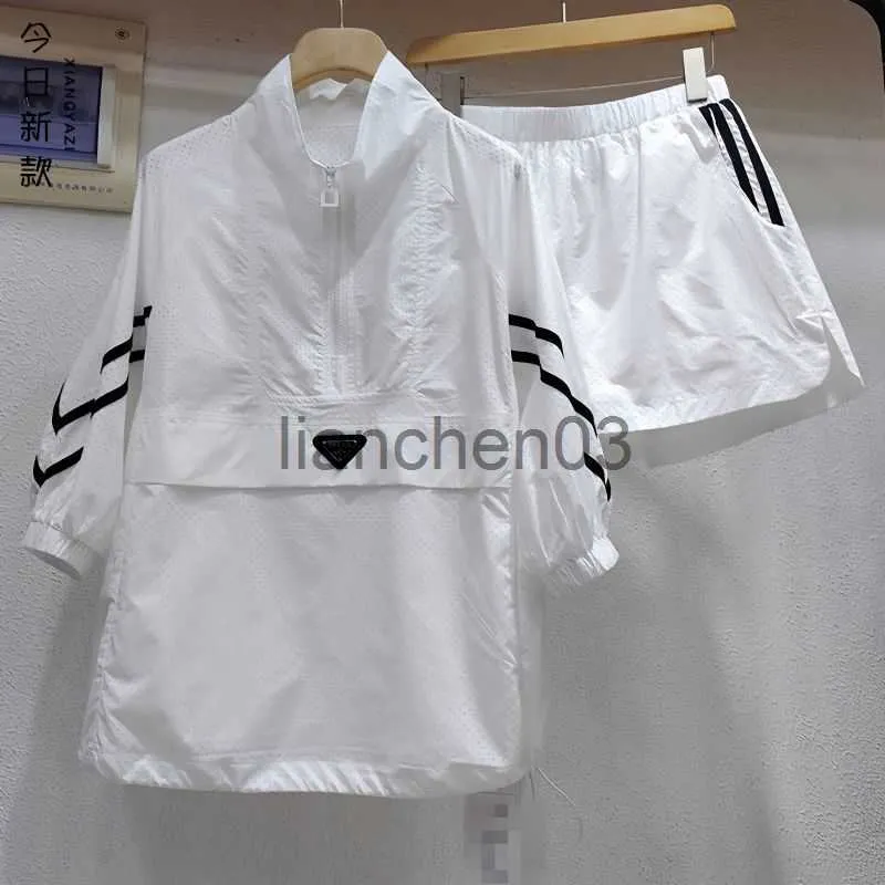 Herrspårar Kvinnors sportdräkt tunn sektion långärmad solskyddsjacka shorts tvådelar vit kostym ny trend slant mode match j230821