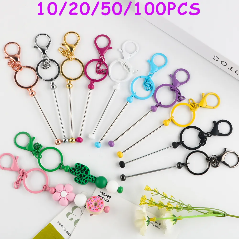 Plüschschlüsselkainer Großhandel 10/20/50/100pcs Perlen Hummerklauenverschluss Schlüsselbund Metall Perlen Keyring DIY Kettenkette Beutel Rucksack Dekor Pendent 230818