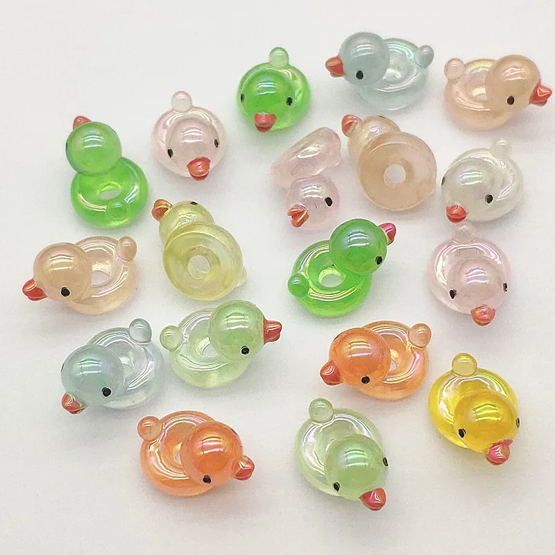 Acryl Plastic Lucite Aankomst 23x15mm 100 pcs UV Luminous Effect Duck Shape Beads voor oorring/ketting diy delen. Jewelry bevindingen Componenten 230820