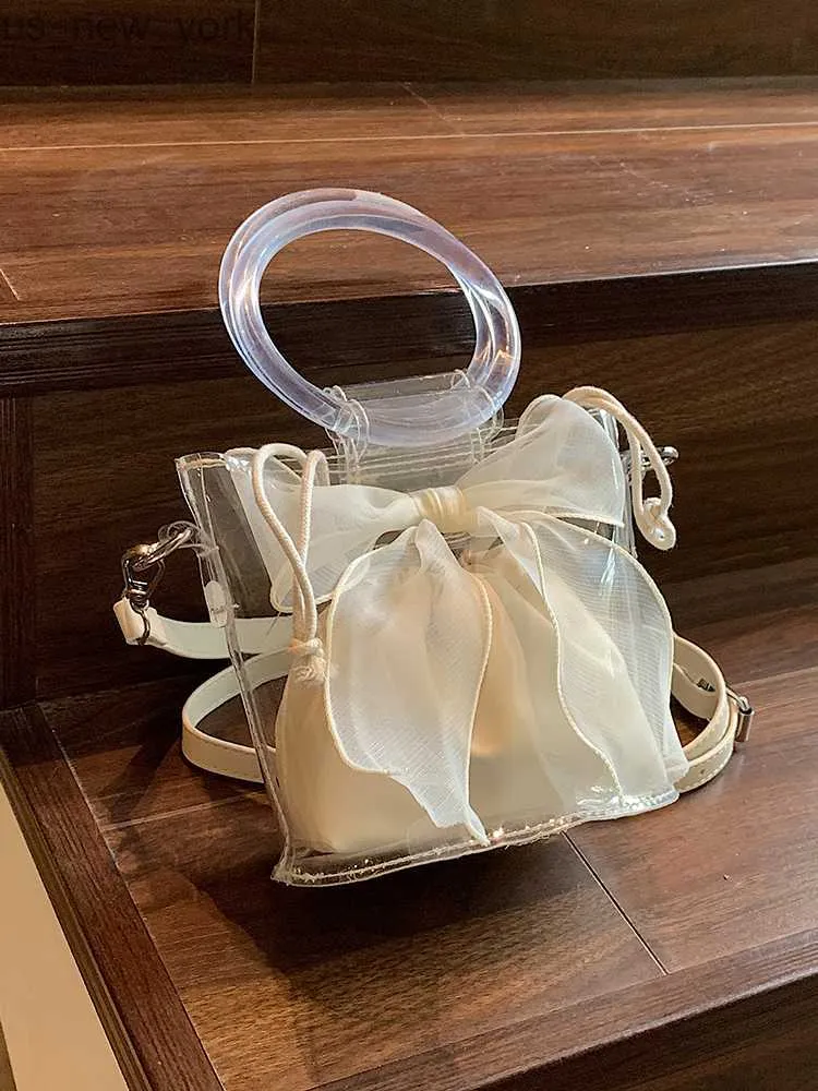 Totes modische Bowknot PVC transparente Gelee -Bucket -Typ tragbare Frauentasche Einfache und lässige vielseitige neue Crossbody -Frauen -Tasche HKD230822