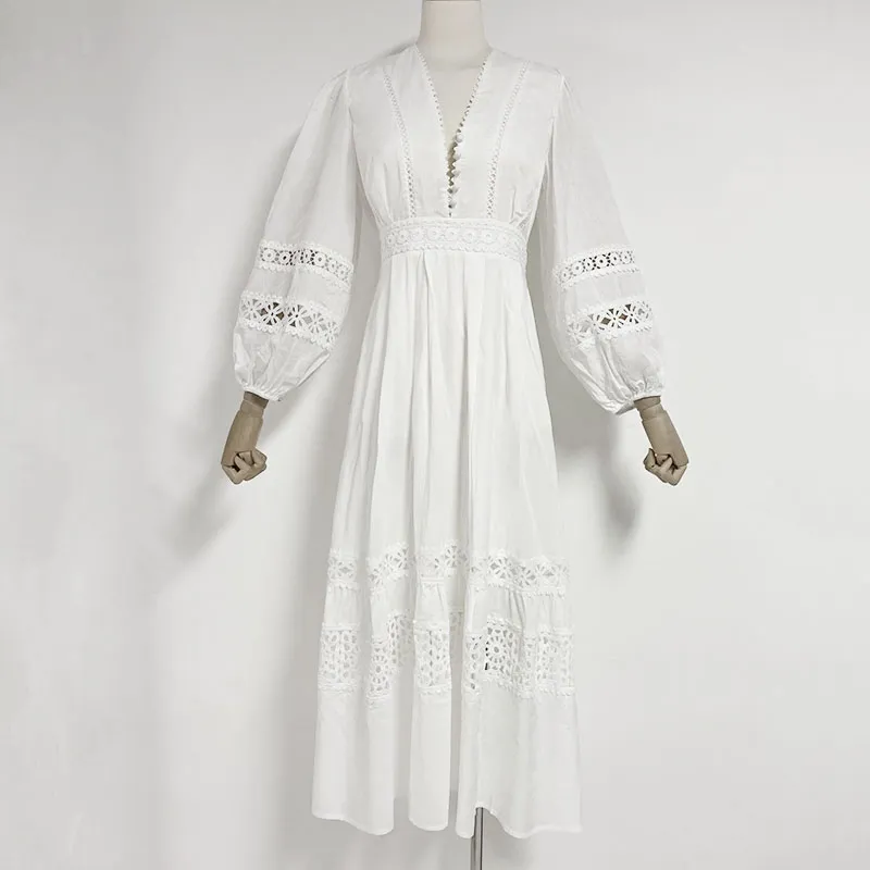 Fashionabla V-ringningsdesign med lapptäcke lykta ärmar för en bantning på klänningen lång kjol
