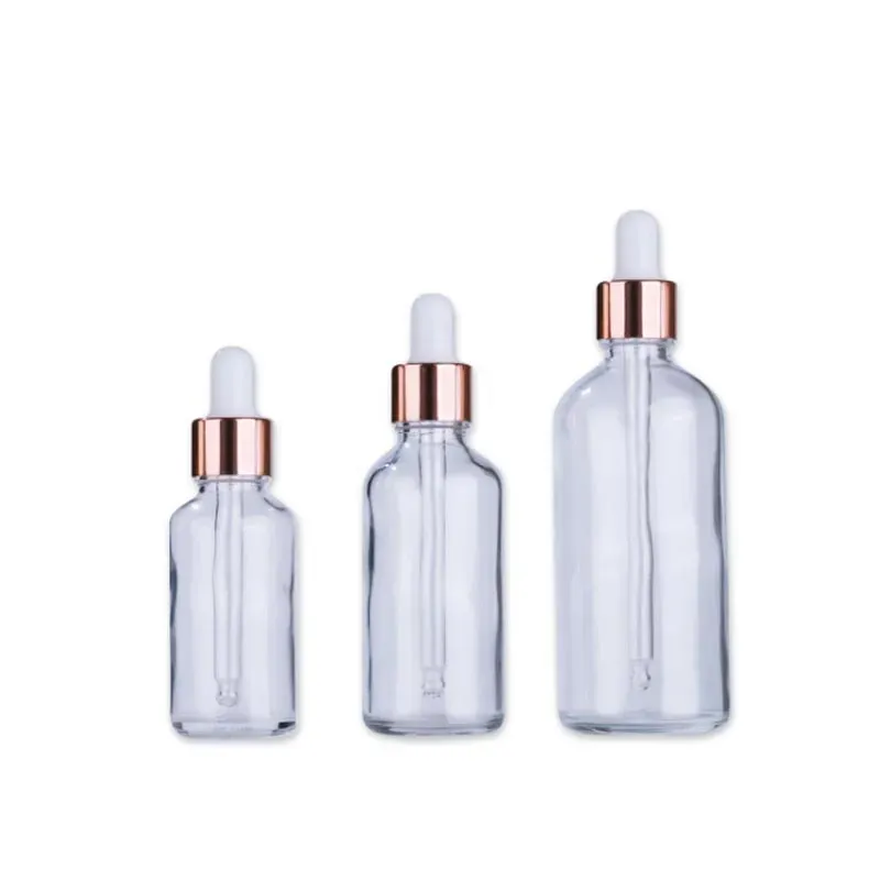 Hurtowe hurtowe szklane butelki z kroplowania 5-100 ml puste pojemnik na olejek eteryczny z nowymi różowatymi pokrywkami 23 ll