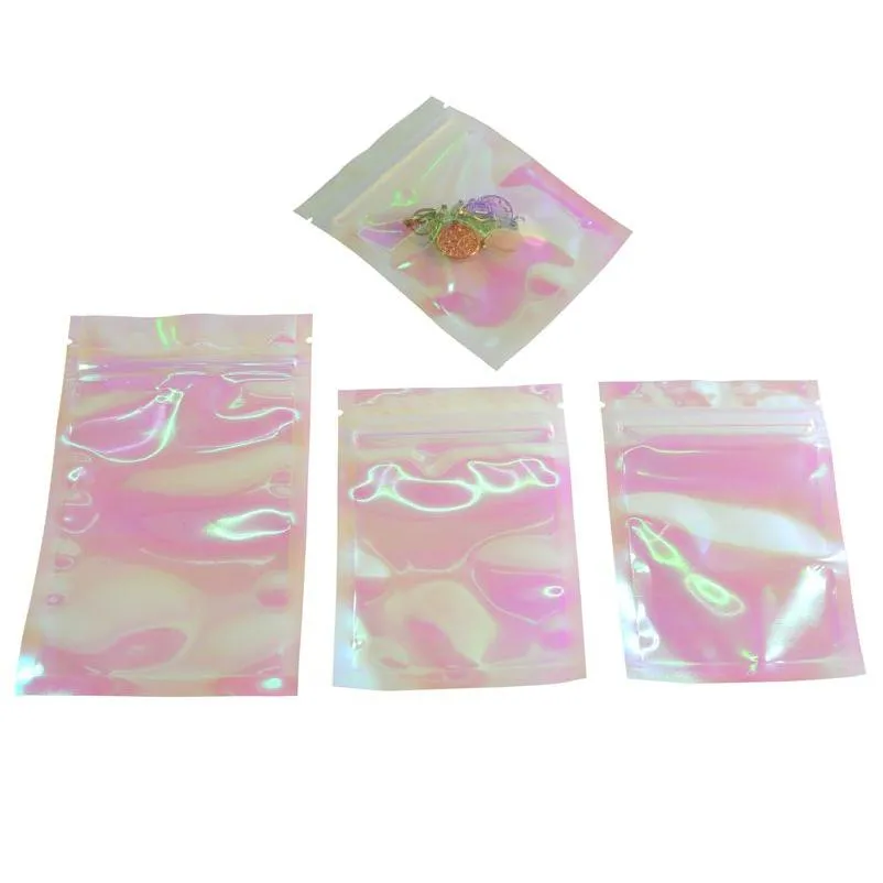 Sacs d'emballage en gros irisé auto-scellant sac pochettes cosmétiques en plastique laser holographique maquillage hologramme fermeture à glissière Lx2914 livraison directe Dhtjw