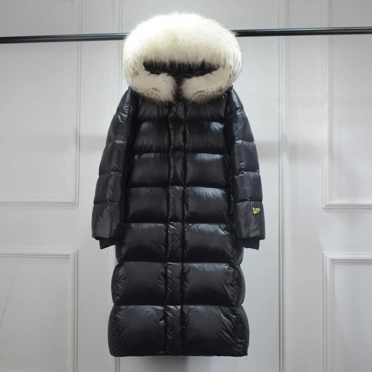 Puffer coat with top raccoon fur hood
