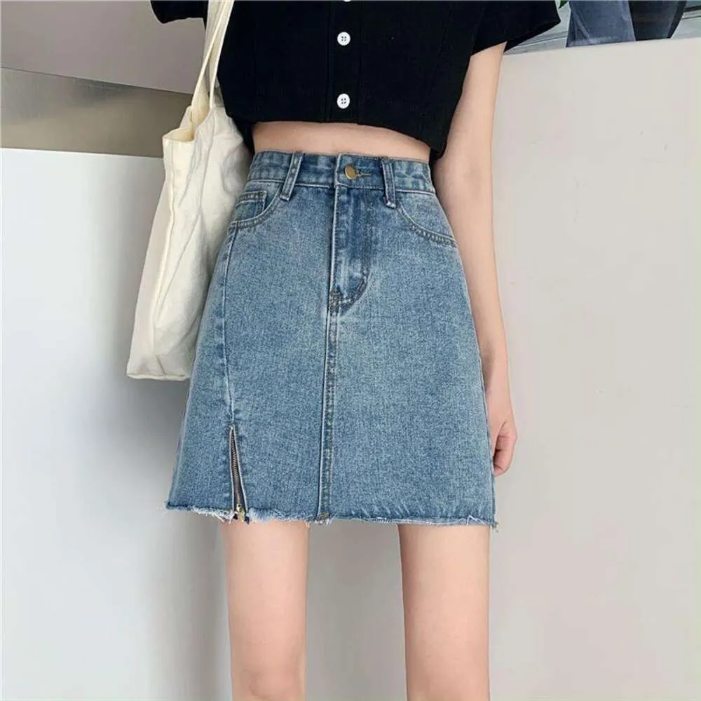 Dżinsowa spódnica z wysokim poziomem dla kobiet Summer Linia szczupła i wszechstronna duża torba Krótki trend