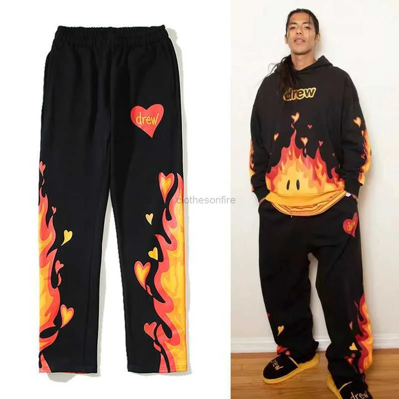 Designers casual pant streetwear jogger byxor svettbyxor drevv skate house leende ansikte flamma amerikansk high street höst vinter plysch byxor par stil lös