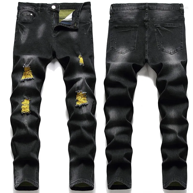 Мужские джинсовые дыры ремесло мужская микро-эластичная тонкая маленькая мода мода взрывной джинсовой дизайн высококачественные брюки.