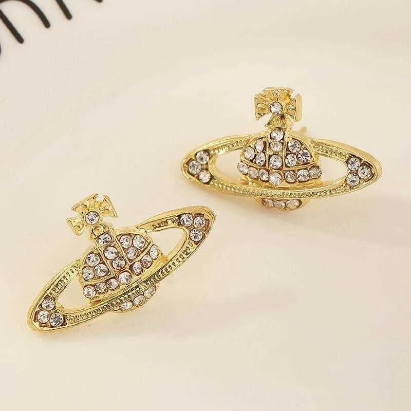 2023Saturn planet earrings minimalist and fashionable planet jewelry Empress Dowager West sparkling diamond 925 silver needle female earringsvivian