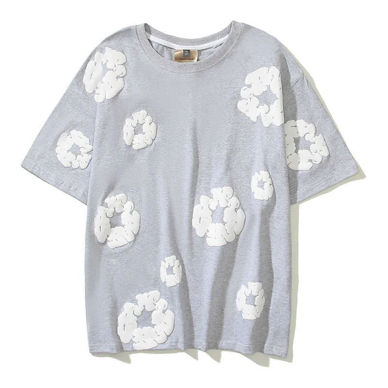 Biała marka kwiatów męskie Kapok projektant mody ubrania luksusowe koszulki Kanyes American High Street Tears Aop Foam I3dd