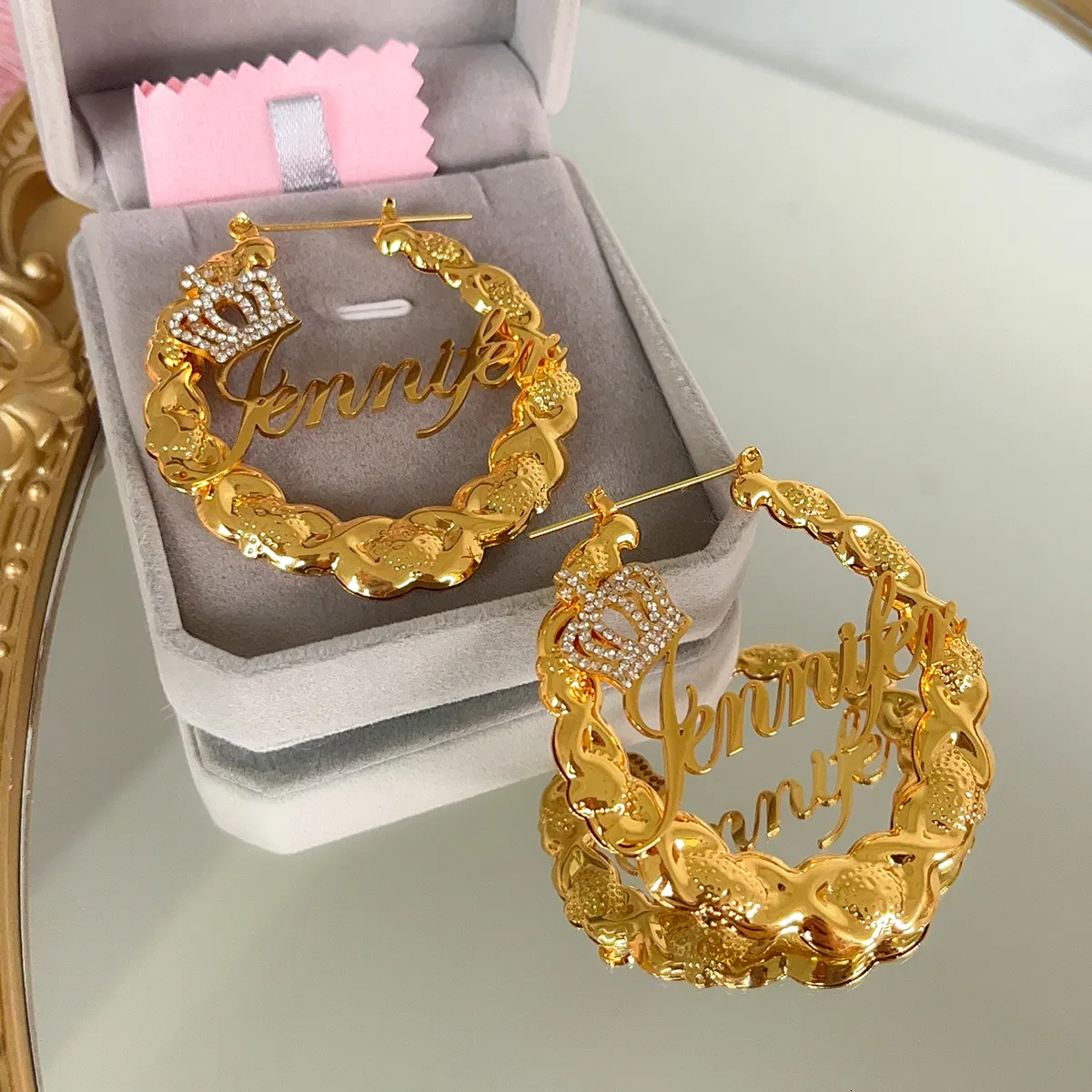 Initial earrings deals with crown