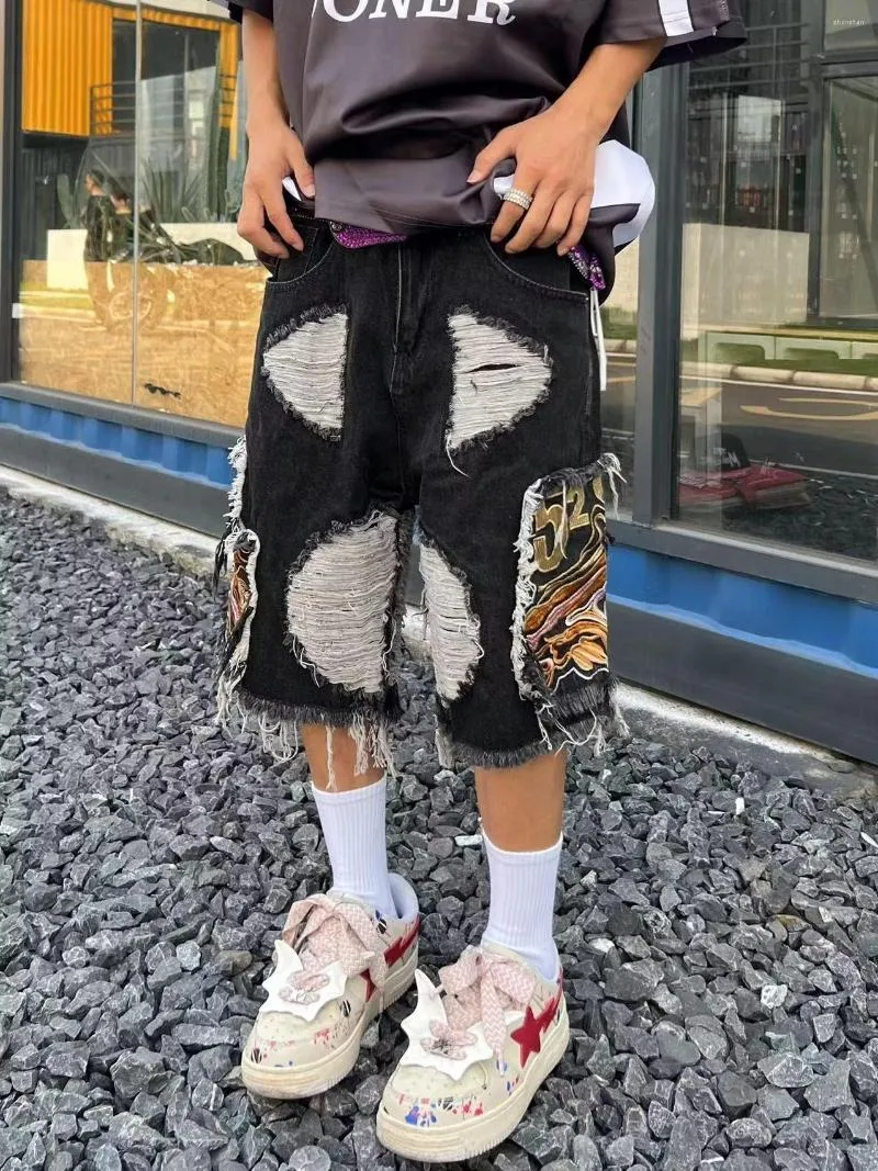 Pantaloncini di discount jeans strappati uomo